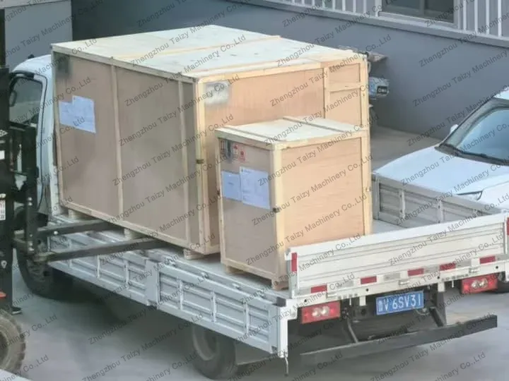 Loading the deep fryer onto the truck